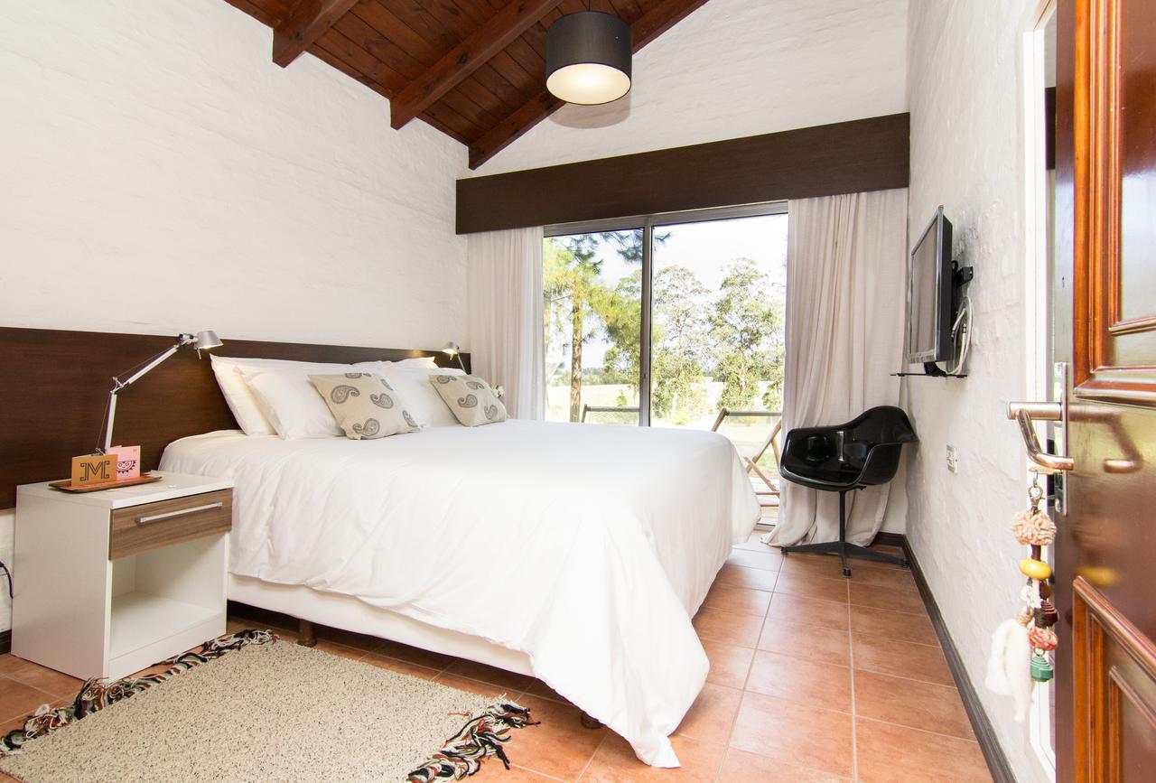 Posada Mosaico Villas Garzon Rum bild